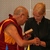 Pasniedzot Tibetas budistu garīgajam līderim Dalailamam Latvijas neatkarības dienai veltīto medaļu Tallinā 2011. gada augustā.